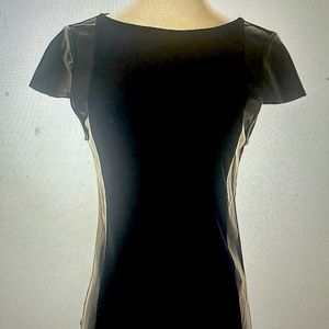 Excellent condition size small 95% poly 5% spandex short sleeve crewneck